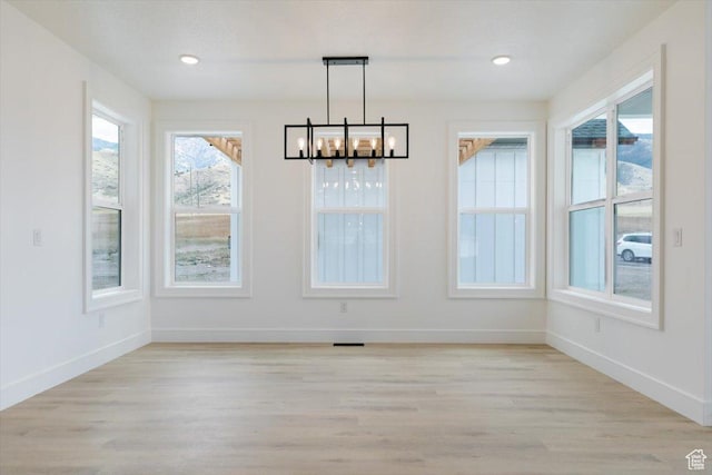 1153 E 160 N, Hyde Park, UT 84318 - unfurnished dining area with recessed lighting, visible vents, light wood-style floors, baseboards, and a chandelier