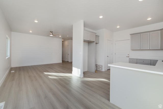 462 E 1035 S, Roosevelt, UT 84066 - kitchen with ceiling fan, light hardwood / wood-style floors, and gray cabinetry