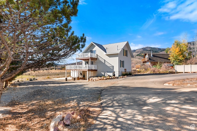 213 Lewis Loop Unit 38, Fish Haven, ID 83287 - view of front facade featuring a mountain view and a balcony