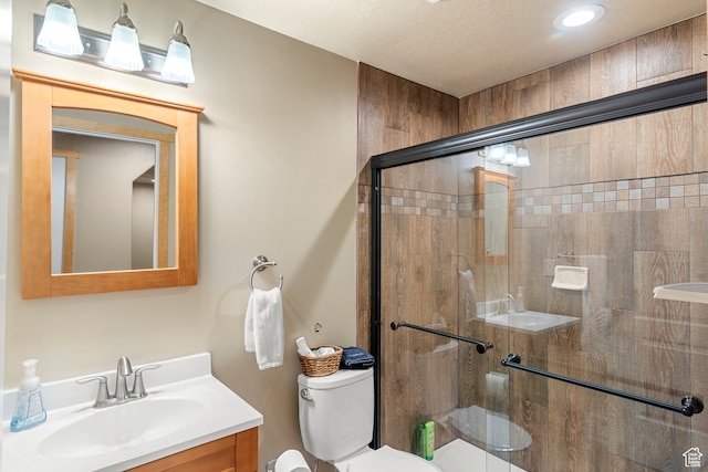213 Lewis Loop Unit 38, Fish Haven, ID 83287 - bathroom featuring walk in shower, vanity, and toilet