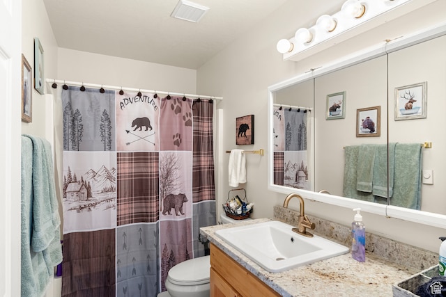 213 Lewis Loop Unit 38, Fish Haven, ID 83287 - bathroom with curtained shower, vanity, and toilet
