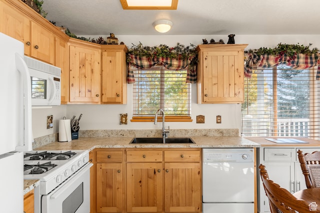 213 Lewis Loop Unit 38, Fish Haven, ID 83287 - kitchen with white appliances, sink, and plenty of natural light
