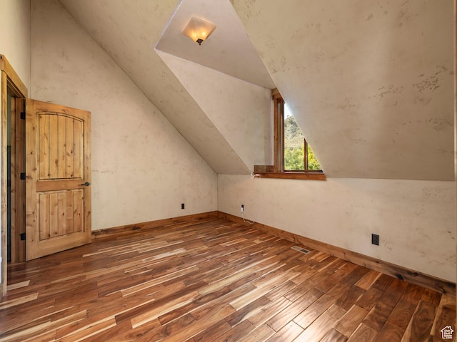 2050 W 2130 N, Helper, UT 84526 - bonus room with visible vents, wood-type flooring, baseboards, and vaulted ceiling