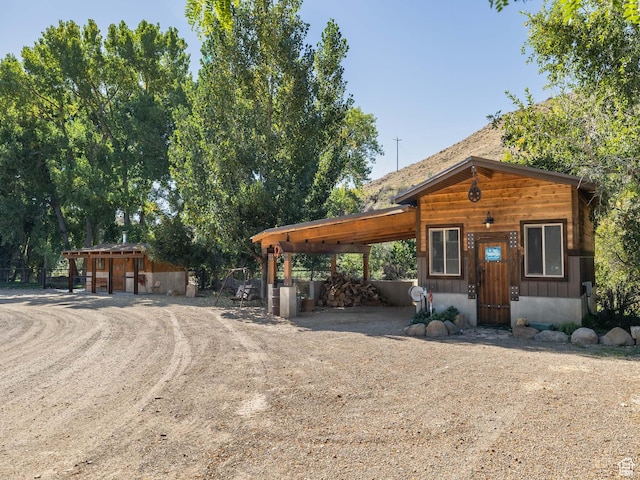 2050 W 2130 N, Helper, UT 84526 - view of front of property featuring an outbuilding and driveway