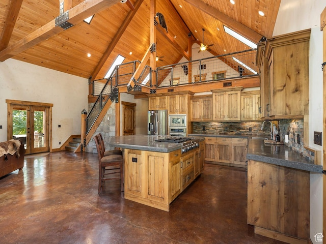 2050 W 2130 N, Helper, UT 84526 - kitchen featuring high vaulted ceiling, wooden ceiling, dark countertops, stainless steel appliances, and backsplash