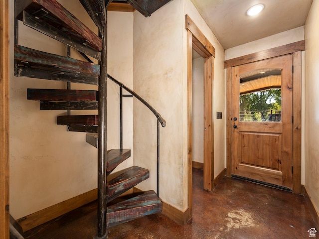 2050 W 2130 N, Helper, UT 84526 - foyer entrance with stairway, baseboards, and concrete flooring