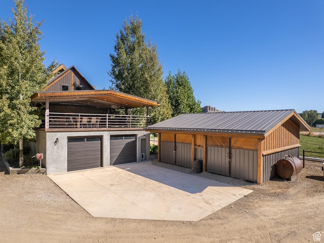2050 W 2130 N, Helper, UT 84526 - garage featuring concrete driveway and heating fuel