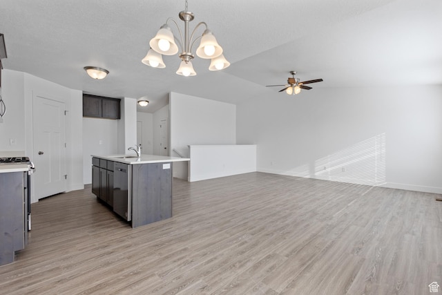 1131 W High Plains Dr Unit 601, Grantsville, UT 84029 - kitchen featuring light wood finished floors, light countertops, appliances with stainless steel finishes, a ceiling fan, and a sink