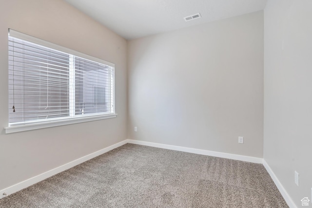 548 E 300 N, Vineyard, UT 84059 - carpeted spare room with visible vents and baseboards