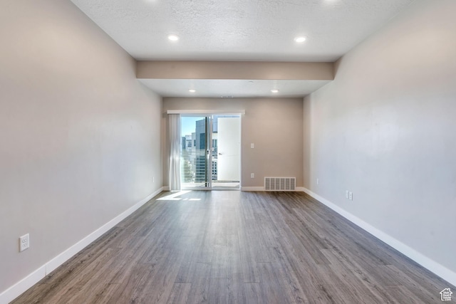 548 E 300 N, Vineyard, UT 84059 - empty room with baseboards, visible vents, and wood finished floors