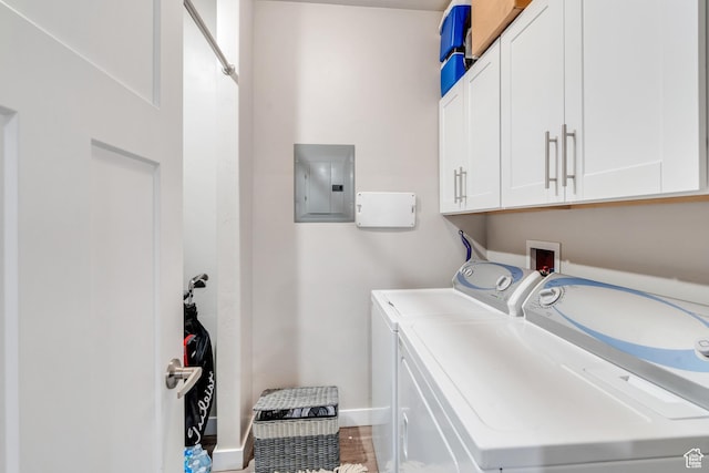 265 N 670 E, Vineyard, UT 84059 - laundry area featuring washing machine and dryer, electric panel, cabinet space, and baseboards