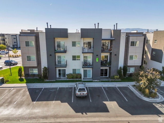 265 N 670 E, Vineyard, UT 84059 - view of building exterior featuring uncovered parking