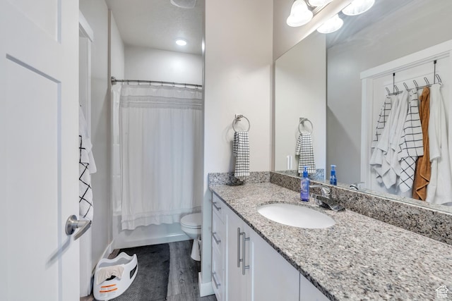 265 N 670 E, Vineyard, UT 84059 - bathroom with shower / bath combo with shower curtain, wood finished floors, toilet, and vanity