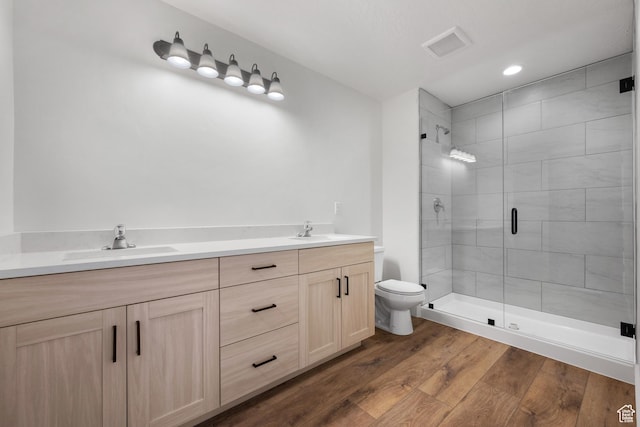 292 500 N, Santaquin, UT 84655 - bathroom featuring a sink, toilet, a stall shower, and wood finished floors