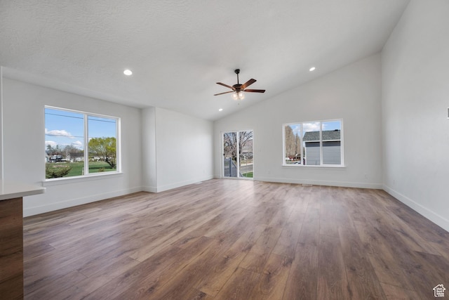292 500 N, Santaquin, UT 84655 - unfurnished living room featuring baseboards, ceiling fan, a textured ceiling, recessed lighting, and wood finished floors