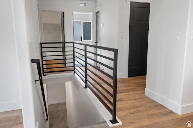 292 500 N, Santaquin, UT 84655 - stairs with wood finished floors, baseboards, and visible vents