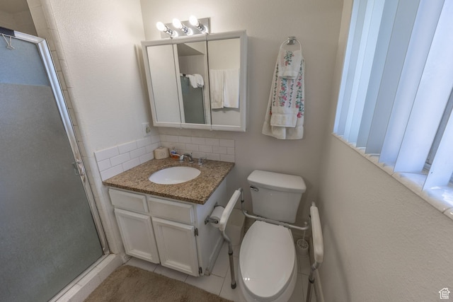 27 E Monticello Dr S, Kaysville, UT 84037 - bathroom featuring a shower stall, backsplash, toilet, and vanity