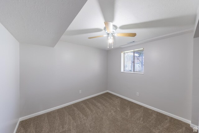 27 E Monticello Dr S, Kaysville, UT 84037 - spare room featuring carpet, visible vents, a ceiling fan, and baseboards