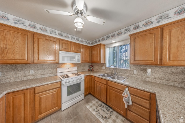 27 E Monticello Dr S, Kaysville, UT 84037 - kitchen with light countertops, white appliances, a sink, and tasteful backsplash
