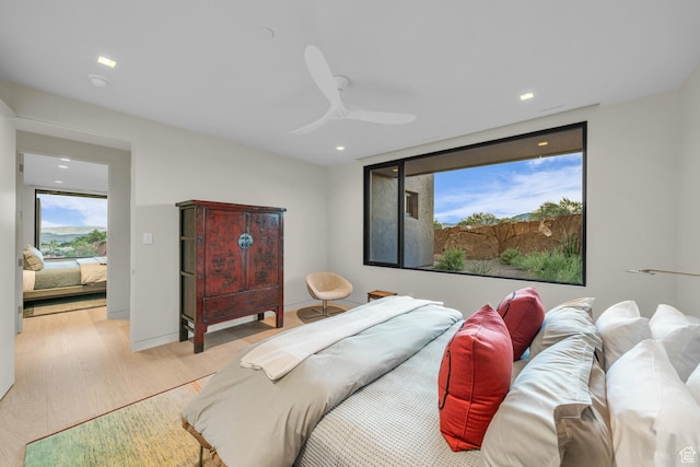 973 W Sipala Trl, Ivins, UT 84738 - bedroom featuring ceiling fan and light wood-type flooring