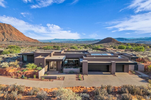 973 W Sipala Trl, Ivins, UT 84738 - exterior space with a mountain view and a garage