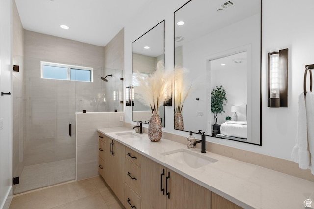 3617 S Cypress Point Rd, Hurricane, UT 84737 - bathroom featuring tile patterned flooring, vanity, and a shower with shower door