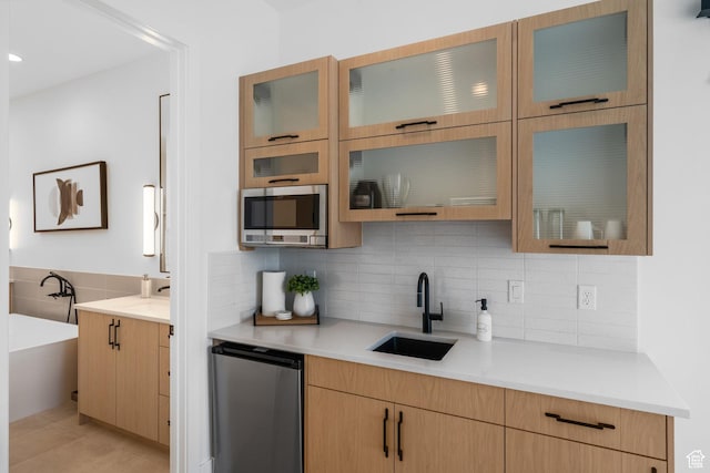 3617 S Cypress Point Rd, Hurricane, UT 84737 - kitchen with sink and decorative backsplash