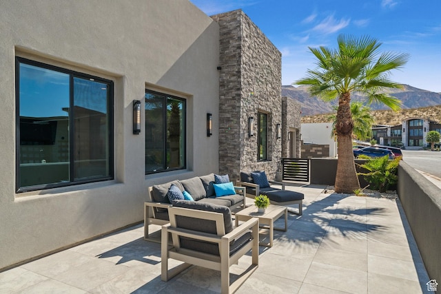 3617 S Cypress Point Rd, Hurricane, UT 84737 - view of patio / terrace featuring a mountain view and an outdoor living space