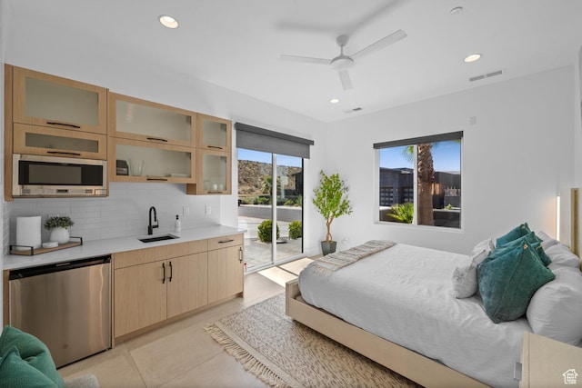 3617 S Cypress Point Rd, Hurricane, UT 84737 - tiled bedroom featuring stainless steel refrigerator, access to exterior, and sink