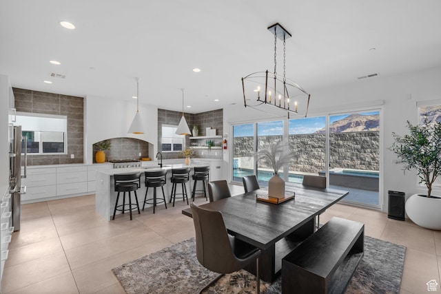 3617 S Cypress Point Rd, Hurricane, UT 84737 - tiled dining room with sink