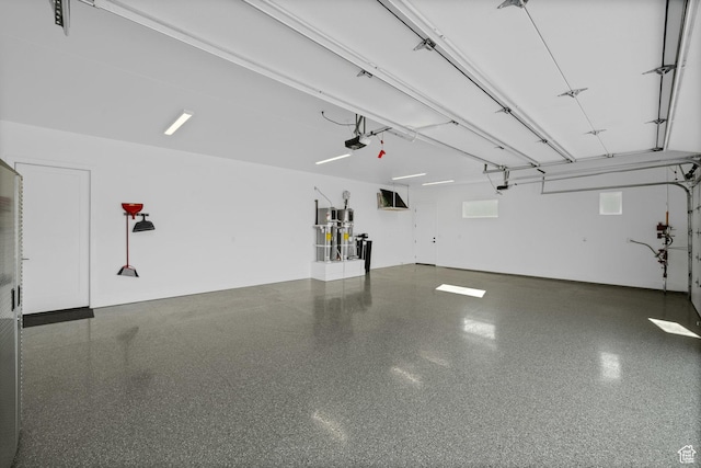 3617 S Cypress Point Rd, Hurricane, UT 84737 - garage featuring a garage door opener