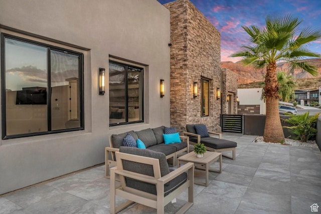 3617 S Cypress Point Rd, Hurricane, UT 84737 - patio terrace at dusk with outdoor lounge area