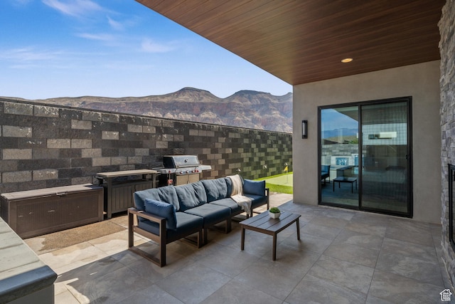 3617 S Cypress Point Rd, Hurricane, UT 84737 - view of patio with grilling area, an outdoor hangout area, and a mountain view