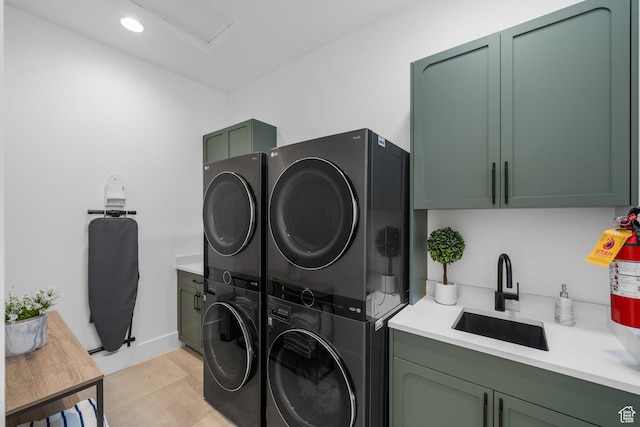 3617 S Cypress Point Rd, Hurricane, UT 84737 - clothes washing area with cabinets, sink, and stacked washer and dryer
