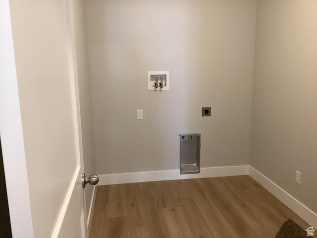 796 W Cherry Orchard Ln S, Grantsville, UT 84029 - washroom featuring electric dryer hookup, baseboards, washer hookup, light wood-style floors, and laundry area