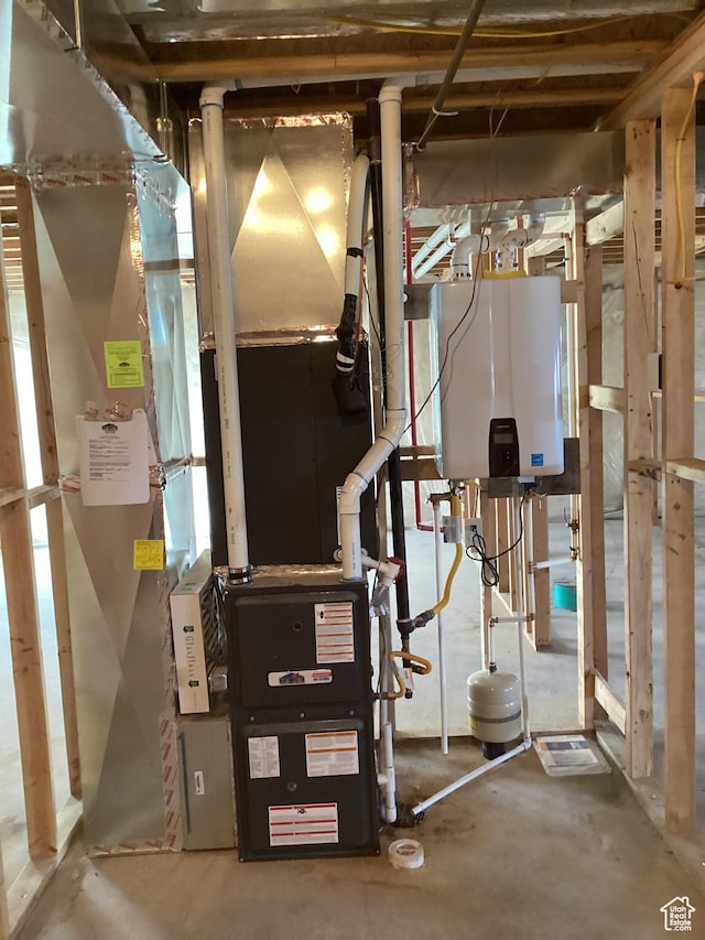 796 W Cherry Orchard Ln S, Grantsville, UT 84029 - utility room featuring water heater