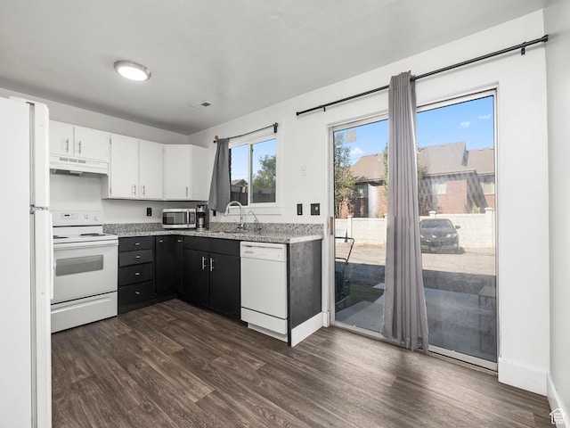 435 E 790 S Unit 8, Pleasant Grove, UT 84062 - kitchen with dark wood finished floors, a sink, under cabinet range hood, and white appliances