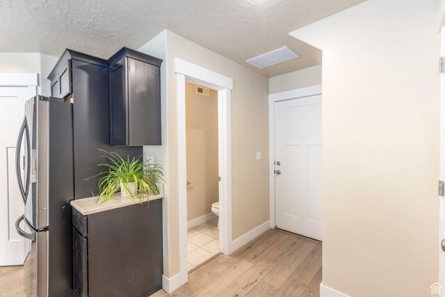 1485 W 350 N, Springville, UT 84663 - interior space with baseboards, light wood finished floors, a textured ceiling, and visible vents