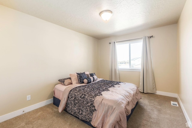 1485 W 350 N, Springville, UT 84663 - bedroom featuring a textured ceiling, visible vents, light carpet, and baseboards
