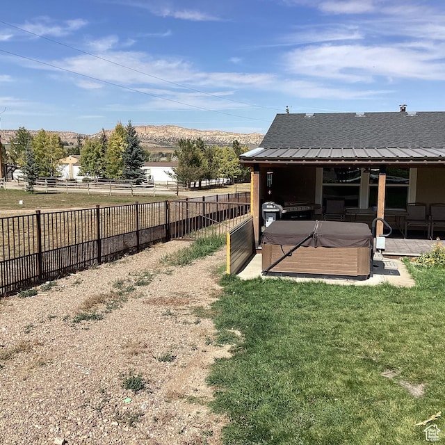 1528 E Valley View Dr, Manila, UT 84046 - view of yard featuring a hot tub and a fenced backyard