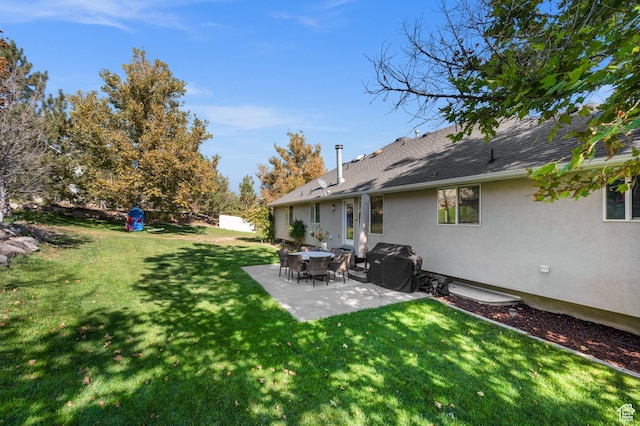view of yard with a patio and fence