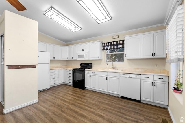 53 Pioneer Way, Hurricane, UT 84737 - kitchen with white appliances, vaulted ceiling, white cabinetry, dark wood-type flooring, and light countertops
