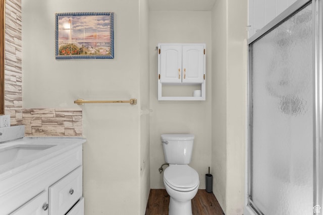 53 Pioneer Way, Hurricane, UT 84737 - full bathroom featuring wood finished floors, a stall shower, and vanity