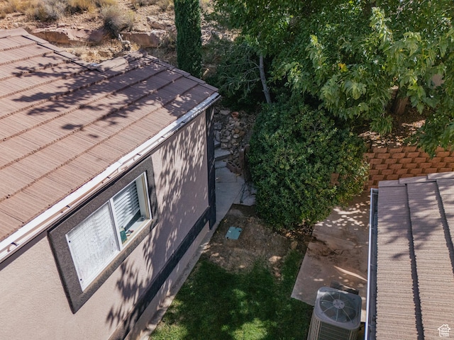 53 Pioneer Way, Hurricane, UT 84737 - view of side of property featuring a central AC unit
