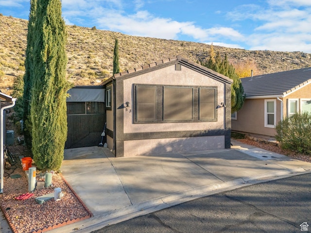 53 Pioneer Way, Hurricane, UT 84737 - ranch-style home with stucco siding and a mountain view