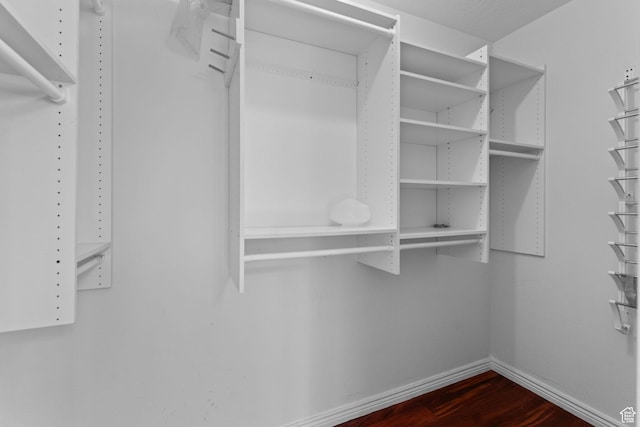 53 Pioneer Way, Hurricane, UT 84737 - walk in closet featuring dark wood finished floors