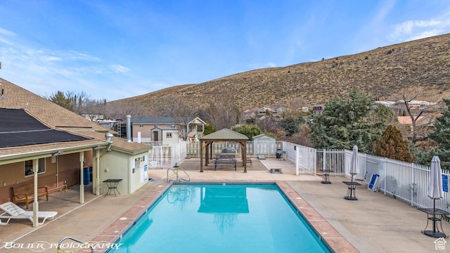 53 Pioneer Way, Hurricane, UT 84737 - community pool featuring a gazebo, a mountain view, and a patio