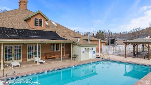 53 Pioneer Way, Hurricane, UT 84737 - community pool featuring a gazebo, a patio area, and french doors