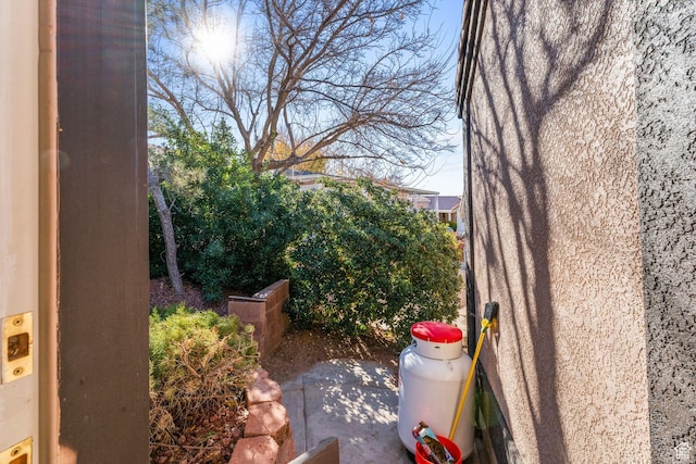 53 Pioneer Way, Hurricane, UT 84737 - view of side of home featuring a patio area