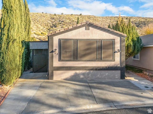 53 Pioneer Way, Hurricane, UT 84737 - view of front facade with stucco siding